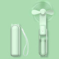 Compact USB handheld cooling fan for travel
