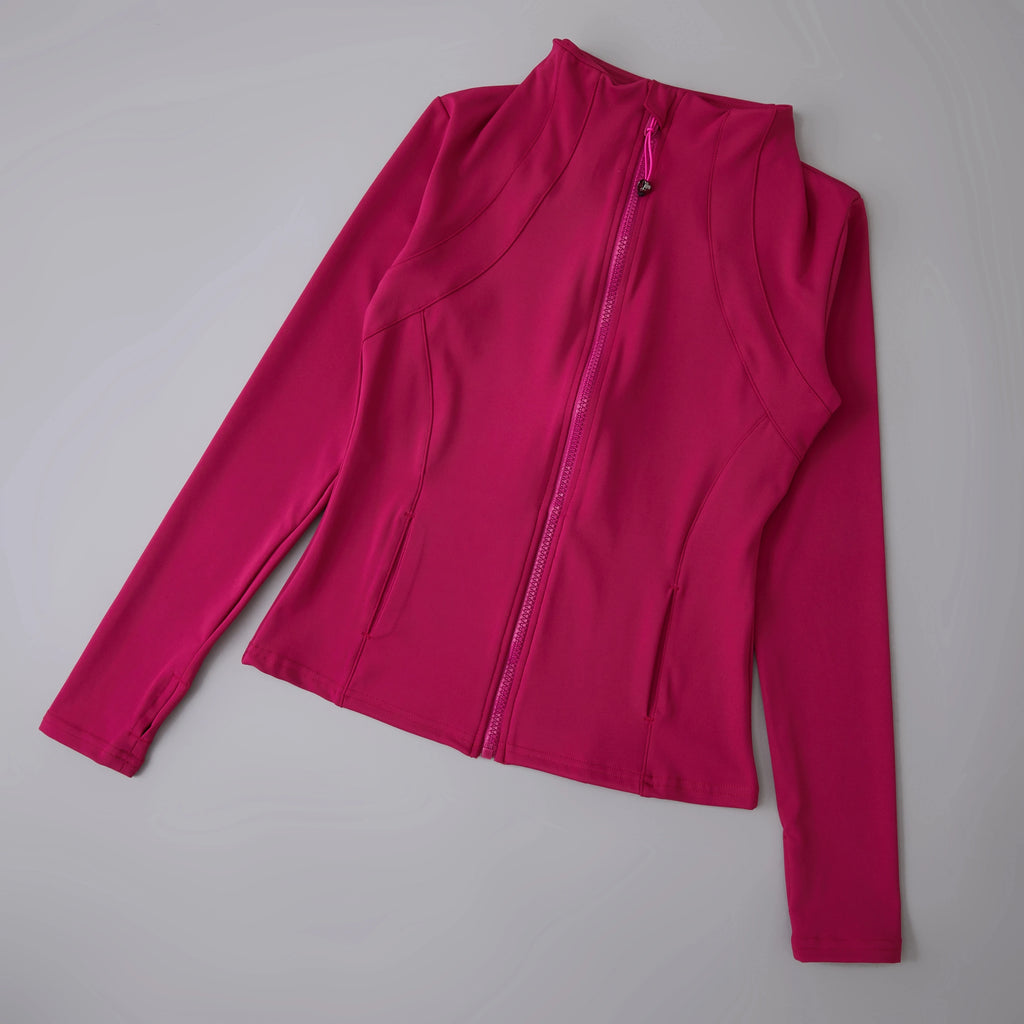Pink long-sleeve active wear with a zipper.