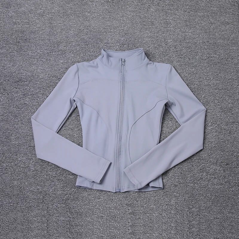 Light gray zip-up jacket on a textured gray background