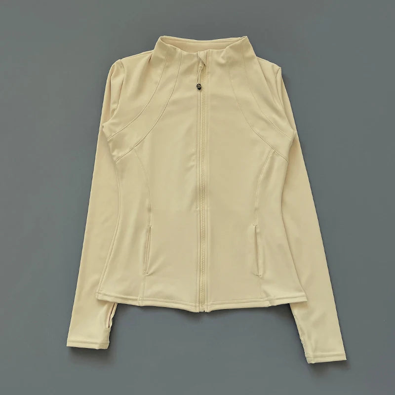 Beige long-sleeve shirt with a zipper on a gray background
