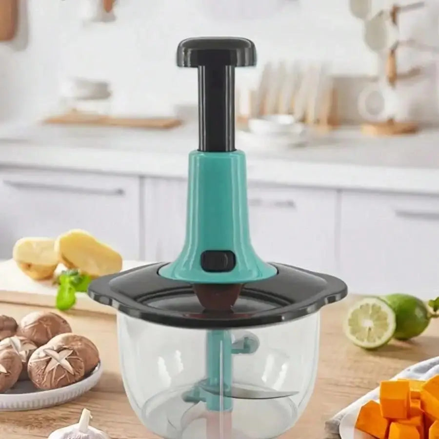 Vegetable and fruit  chopper on a kitchen counter with ingredients in the background