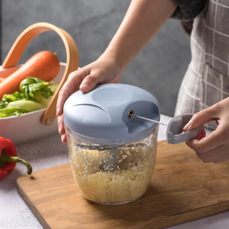 Hand-pull vegetable chopper for meal prep
