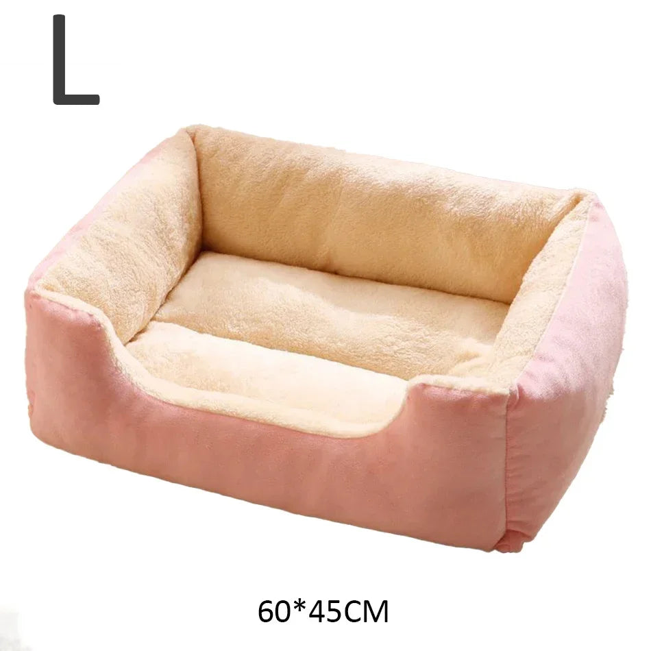 Pet bed with pink and beige color scheme on a white background