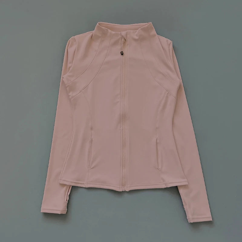 Pink long-sleeve top with a zipper on a gray background