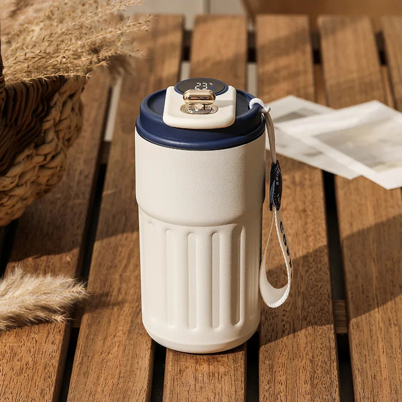 White and navy blue insulated coffee cup 