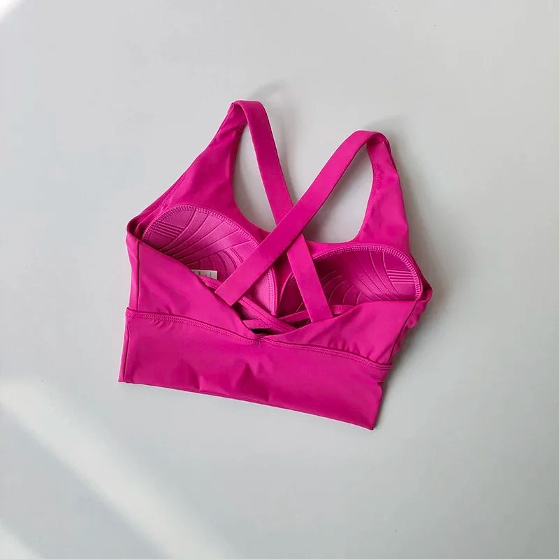 Beautiful Pink sports bra with a cross back. 