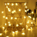 Warm white star LED fairy string lights.
