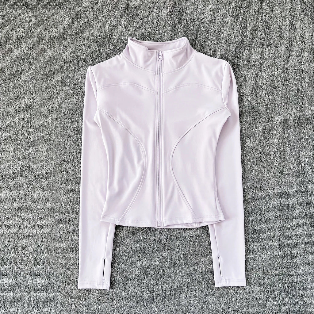 White zip-up athletic jacket on a gray textured background