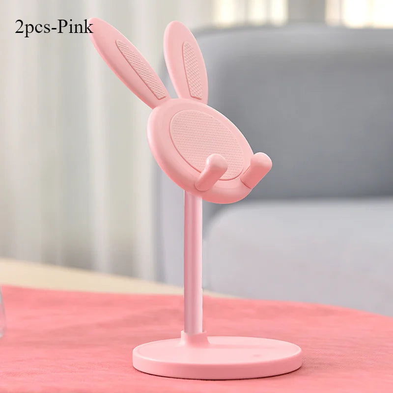 Pink bunny-shaped stand on a pink surface with a blurred background