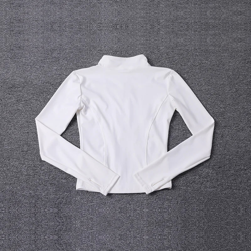 White long-sleeve shirt on a gray textured background